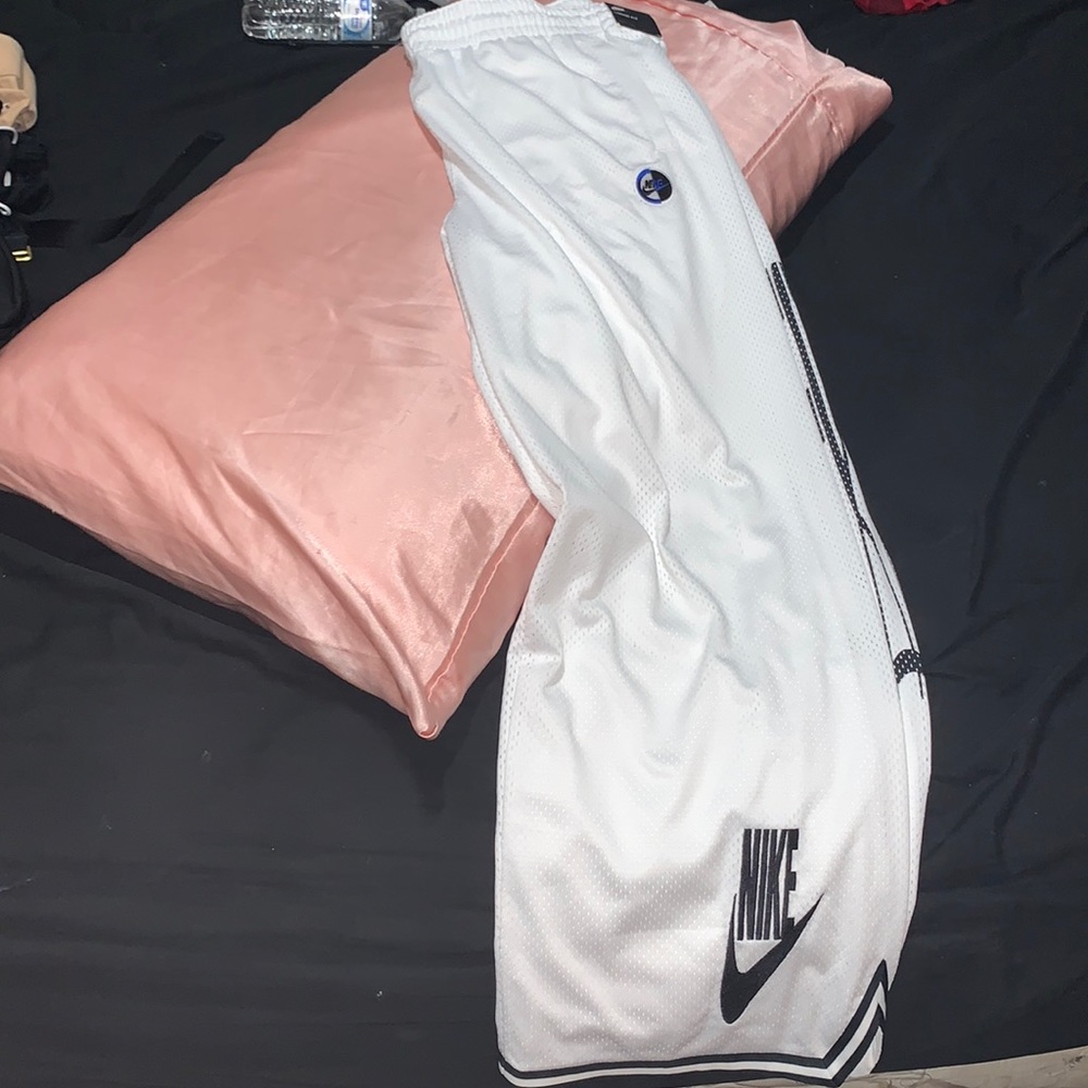 White loose fit Nike track pants